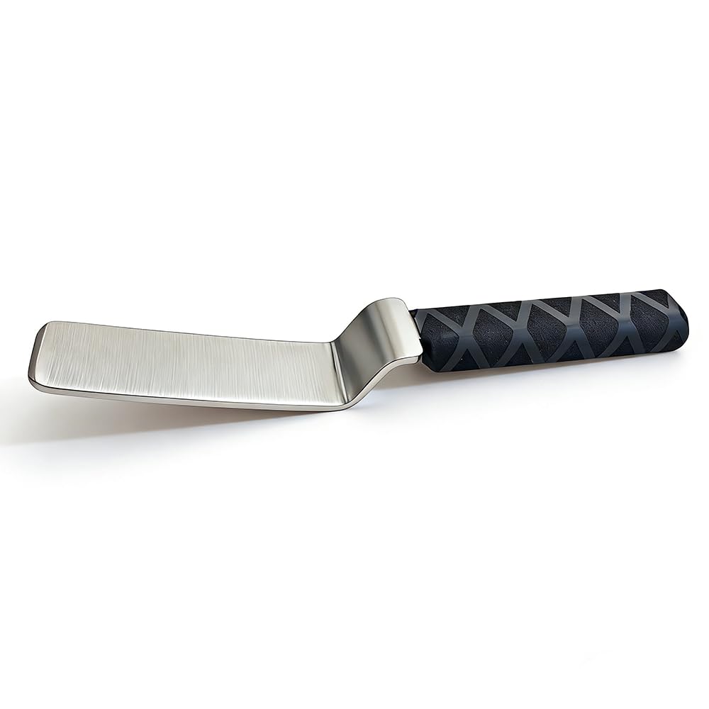 QDentMov spoon head close-up highlighting hardened steel for durable impact