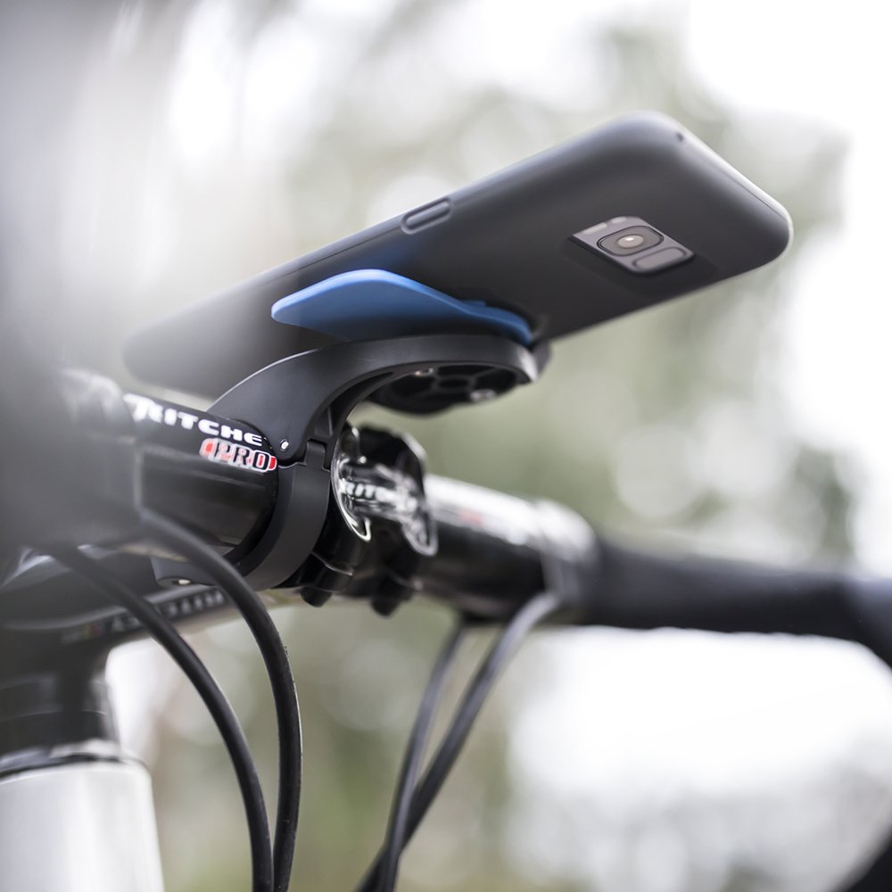 Quad Lock with phone locked in place illustrating reliable dual-stage security on rides