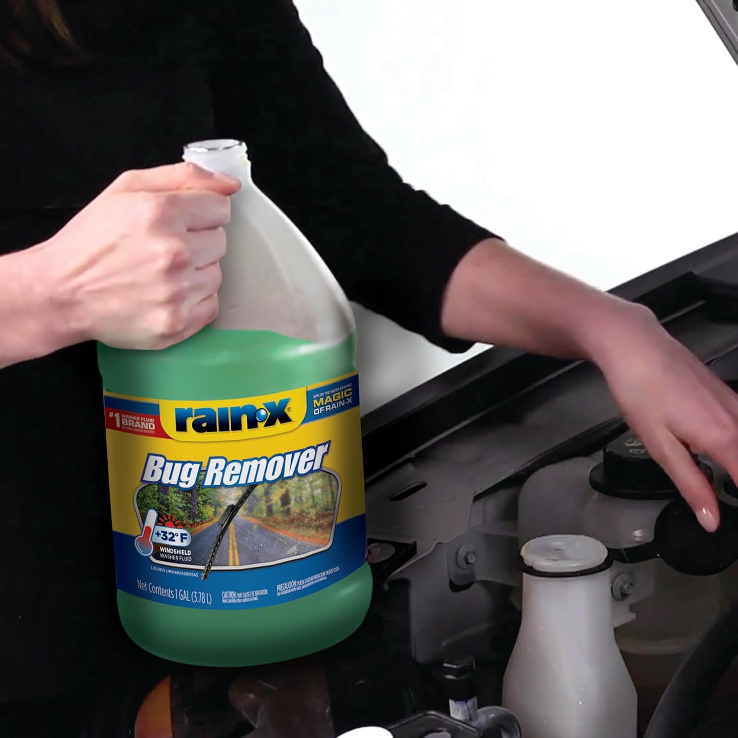 rain‑x bottle next to hand to show portable size and easy storage