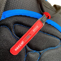 RECCO reflector attached to backpack strap demonstrating secure mounting benefit