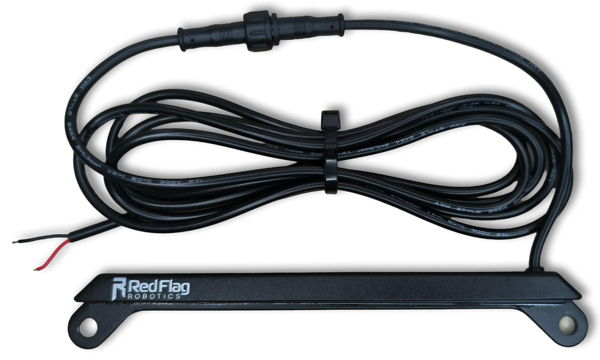Red Flag Robotics front-view license plate light showing compact fit and bright coverage