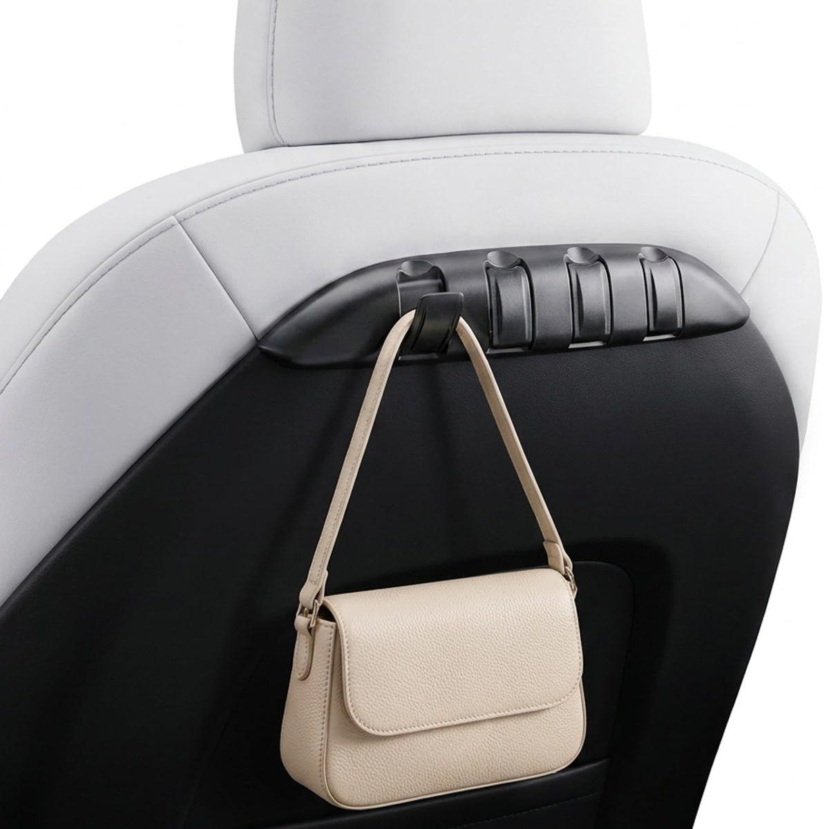 REEVAA front view installed on Tesla seat back shows neat storage benefit