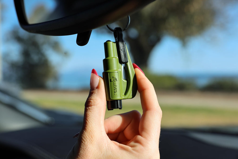 RESQME on keyring inside car demonstrating immediate access when parked or commuting