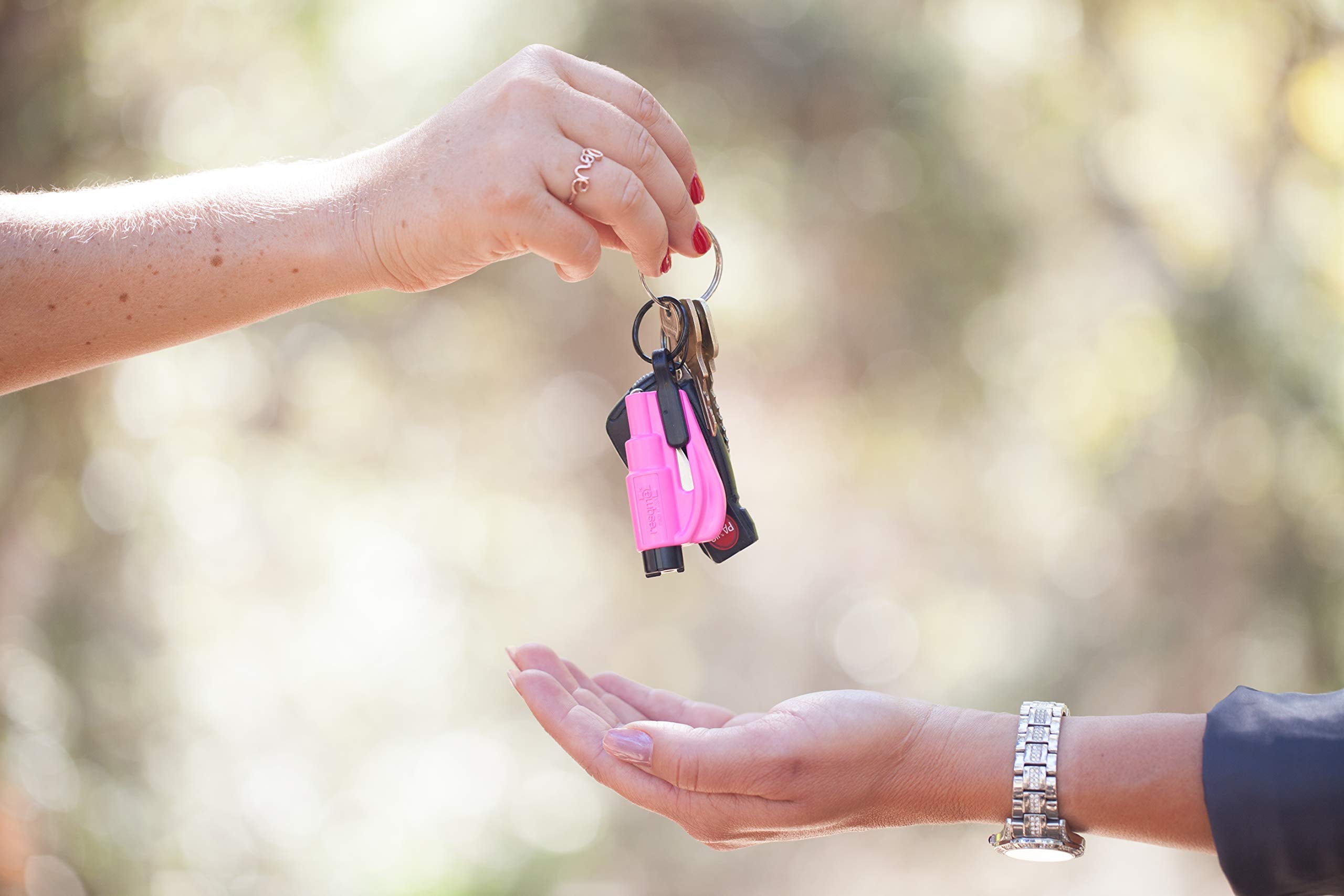 RESQME on a keyring with car keys, portable everyday carry for immediate access benefit