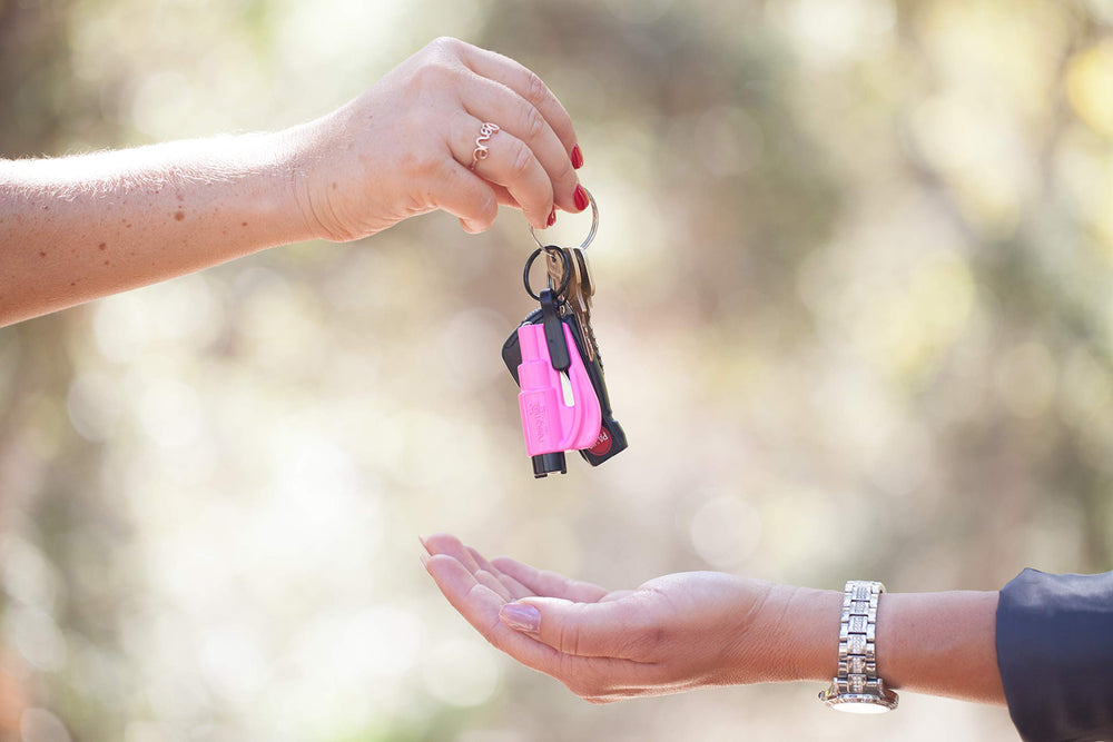 RESQME on a keyring with car keys, portable everyday carry for immediate access benefit