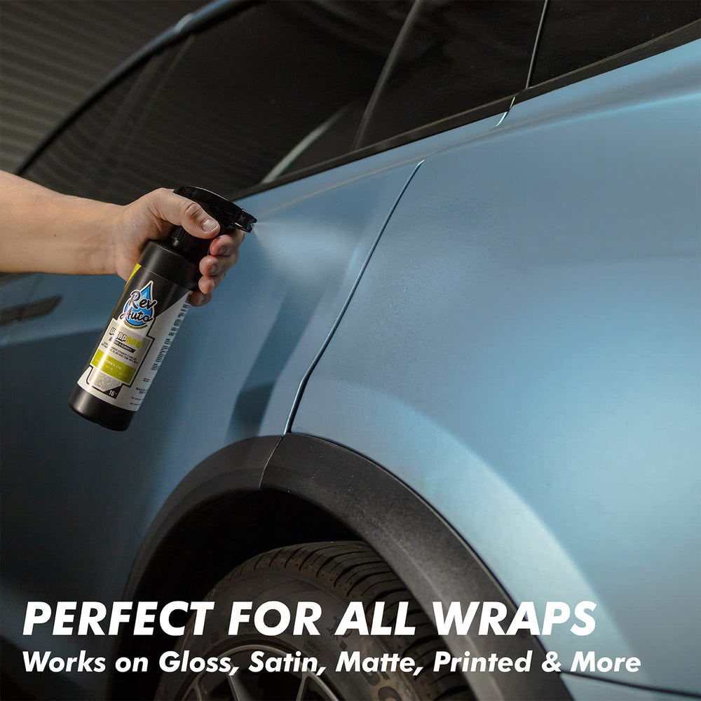 Rev Auto being wiped on a wrapped car door, removes scuffs and restores appearance