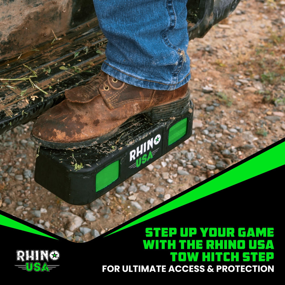 Rhino USA lifestyle image of loading cargo using the hitch step for convenience