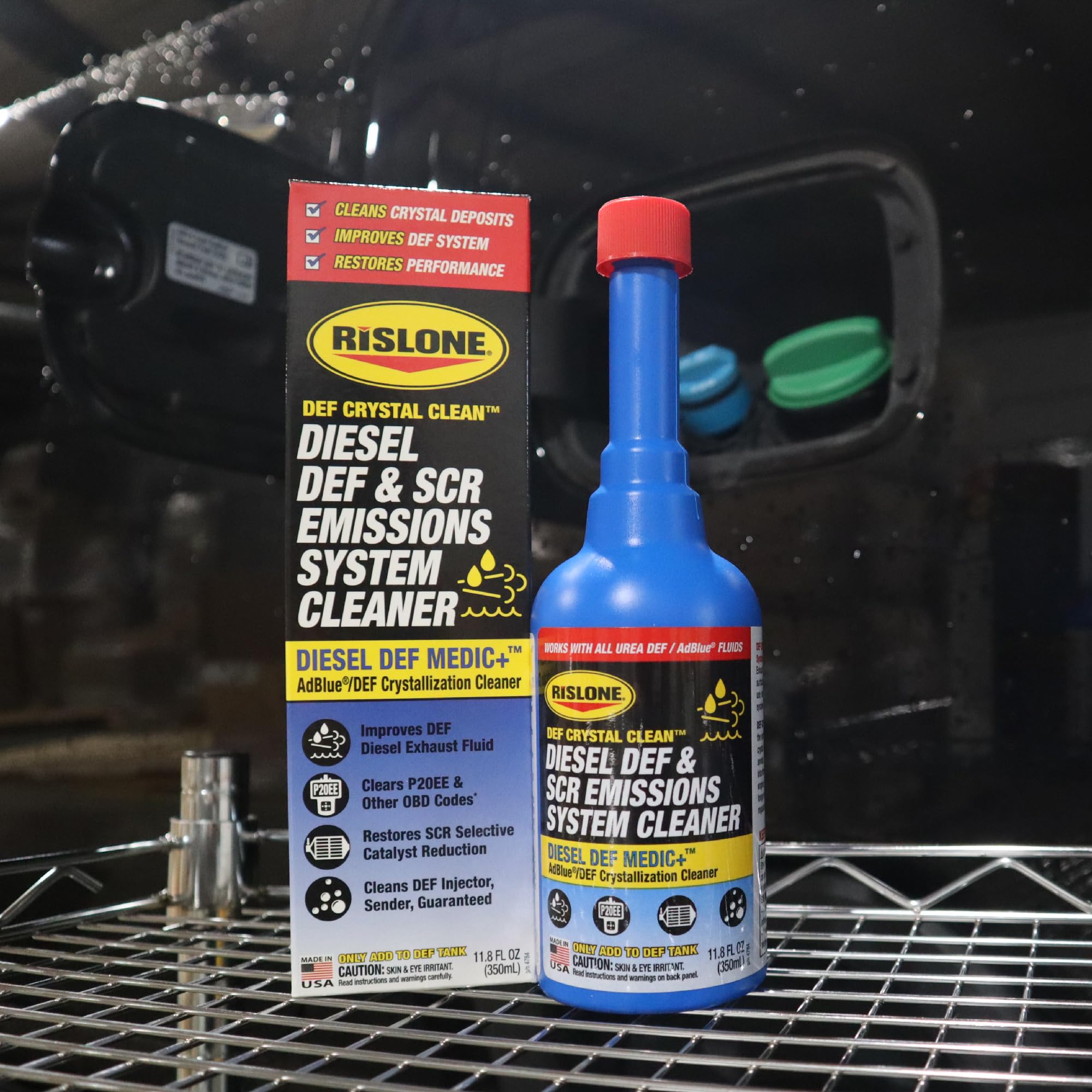 Fleet technician using Rislone in a maintenance garage to reduce downtime