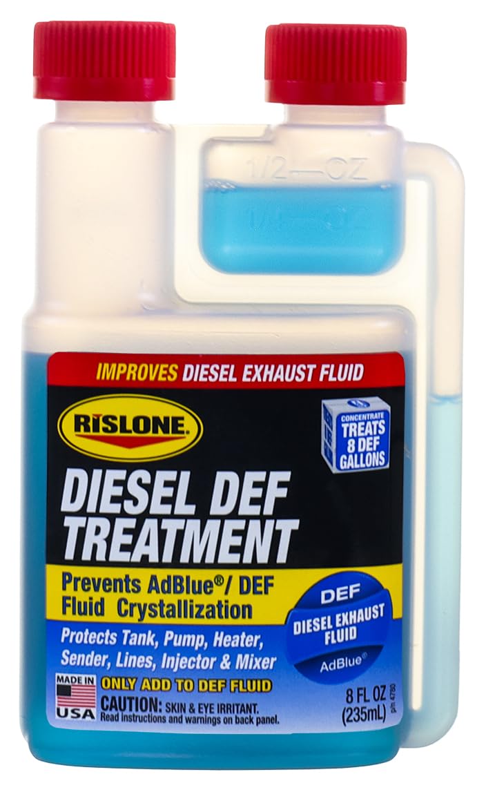 Pouring Rislone DEF Treatment into a vehicle DEF tank to prevent deposits