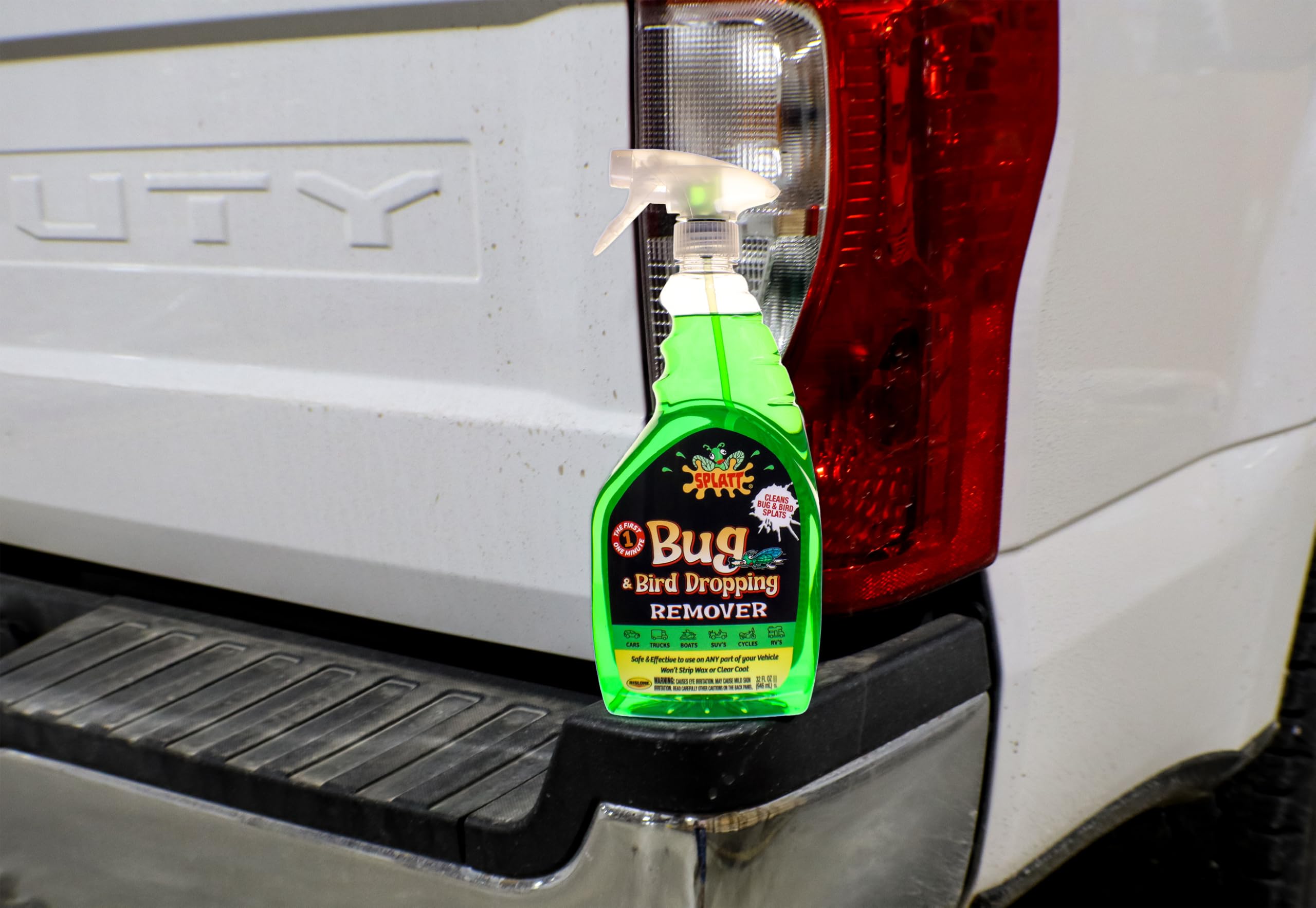 Rislone in use with person wiping car illustrating fast cleanup and safe finish preservation