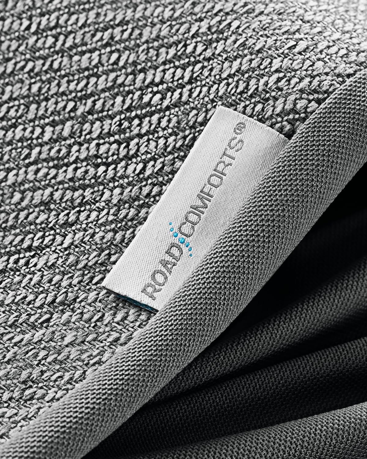 Road Comforts seat cover in use inside car demonstrating durable protection