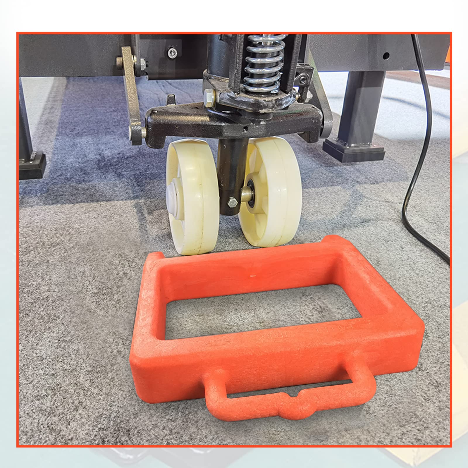 ROBLOCK chock placed inside delivery truck to secure pallet jack during transit