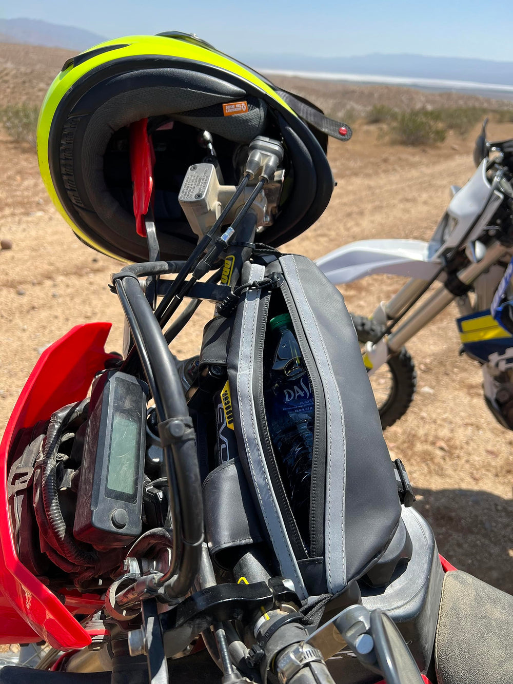 ROBOCUP mounted on adventure motorcycle demonstrating stable fit on bars