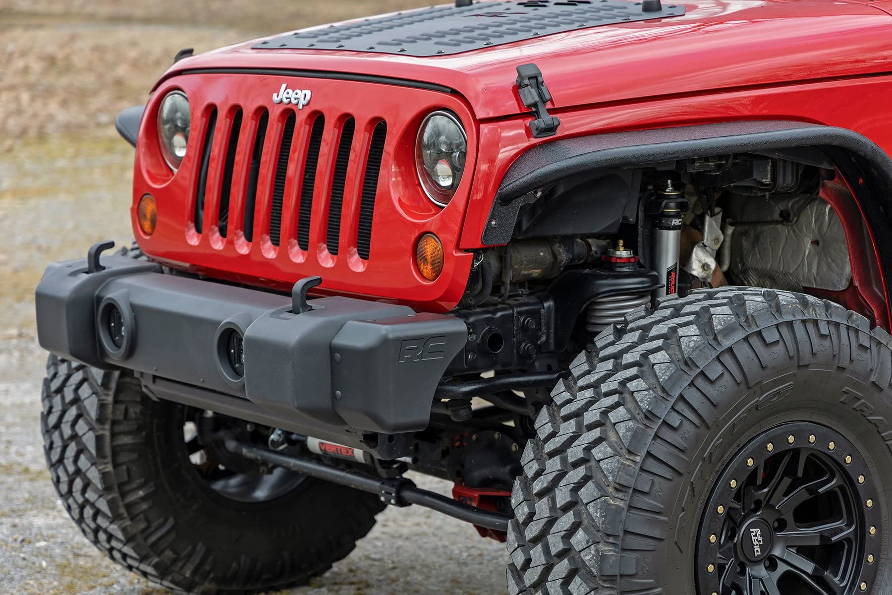 Rough Country installed on Jeep Wrangler JK on trail illustrating clearance improvement