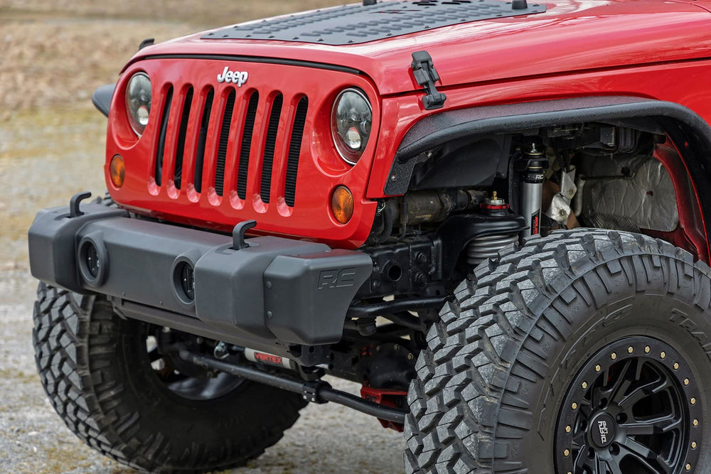 Rough Country installed on Jeep Wrangler JK on trail illustrating clearance improvement