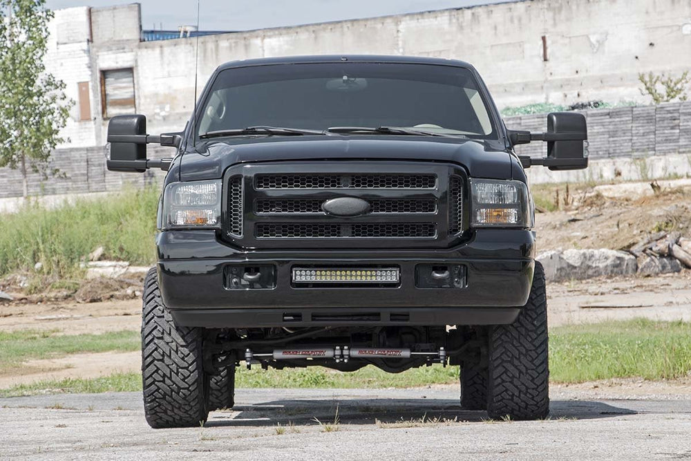 Rough Country installed on Super Duty front profile showing leveled stance benefit