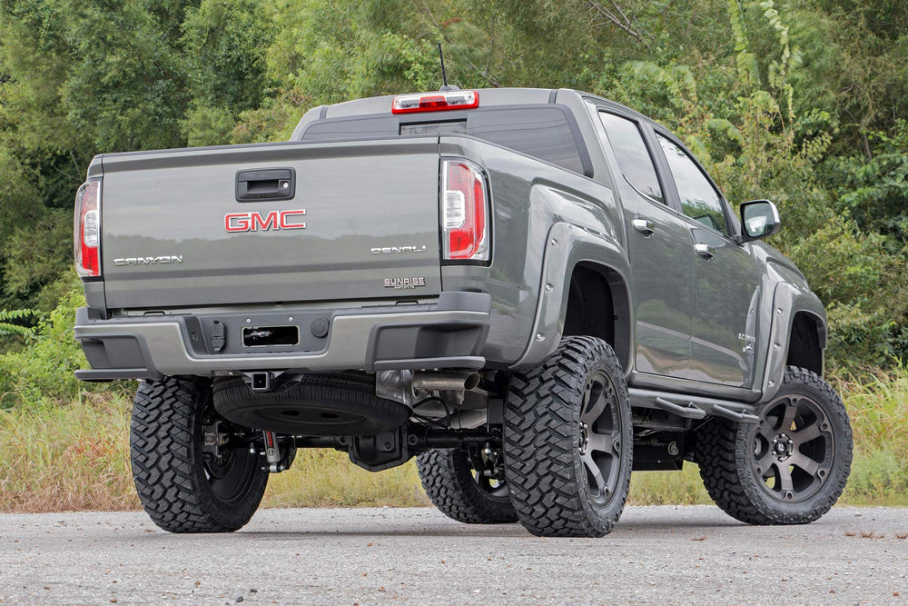 Rough Country N3 shocks on lifted Ram 1500 in off-road setting for confident handling
