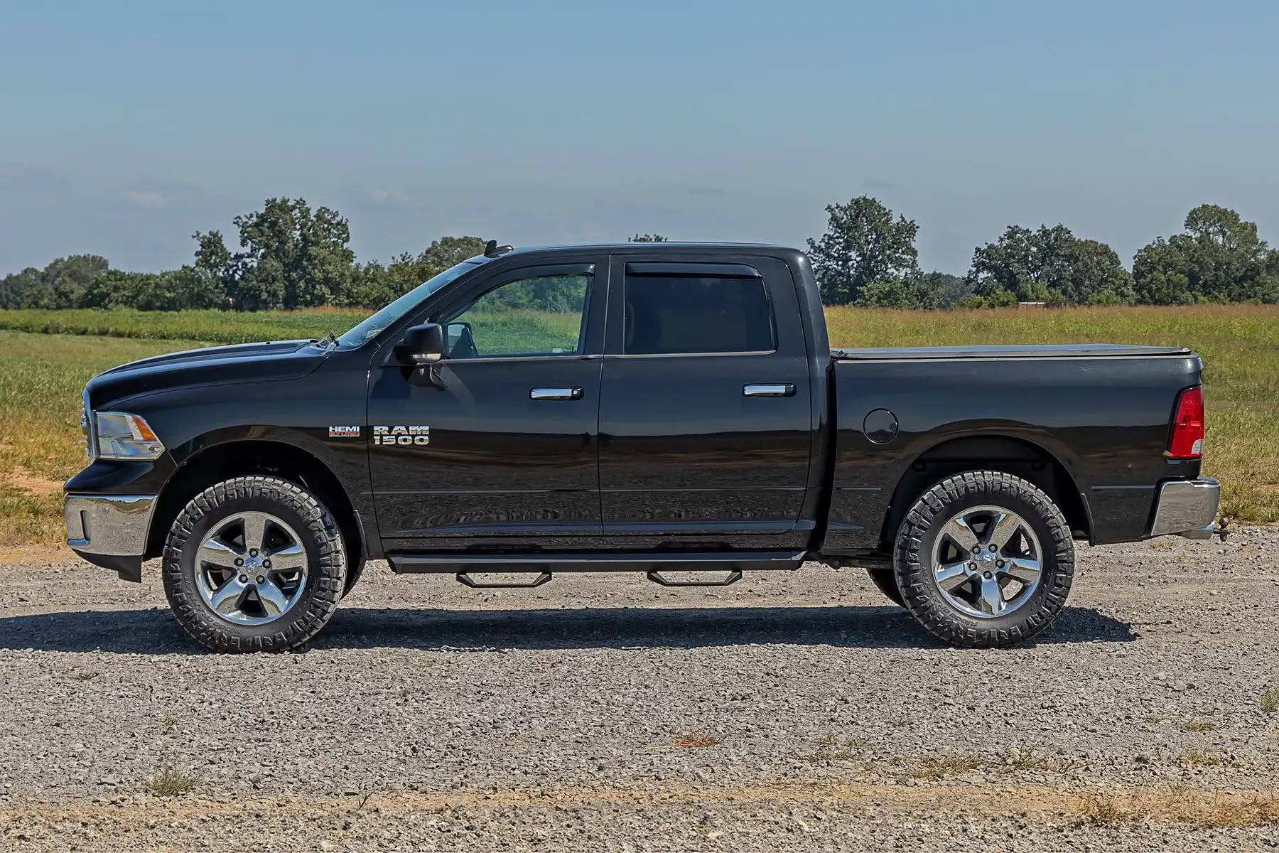 Rough Country size comparison next to tire showing accurate fit and scale