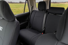 Rough Country seat in use with dog demonstrating durable protection and easy cleaning