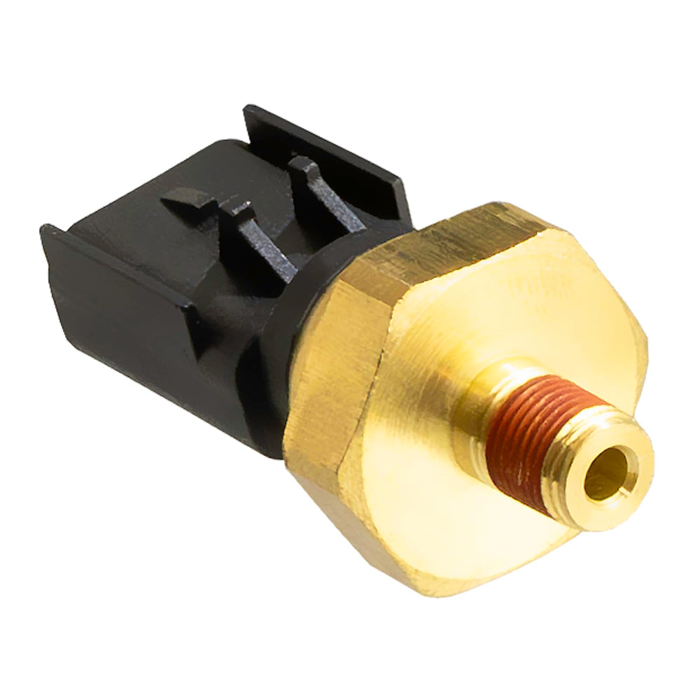 Ruizure sensor staged in garage setting showing practical use and mechanic-friendly design