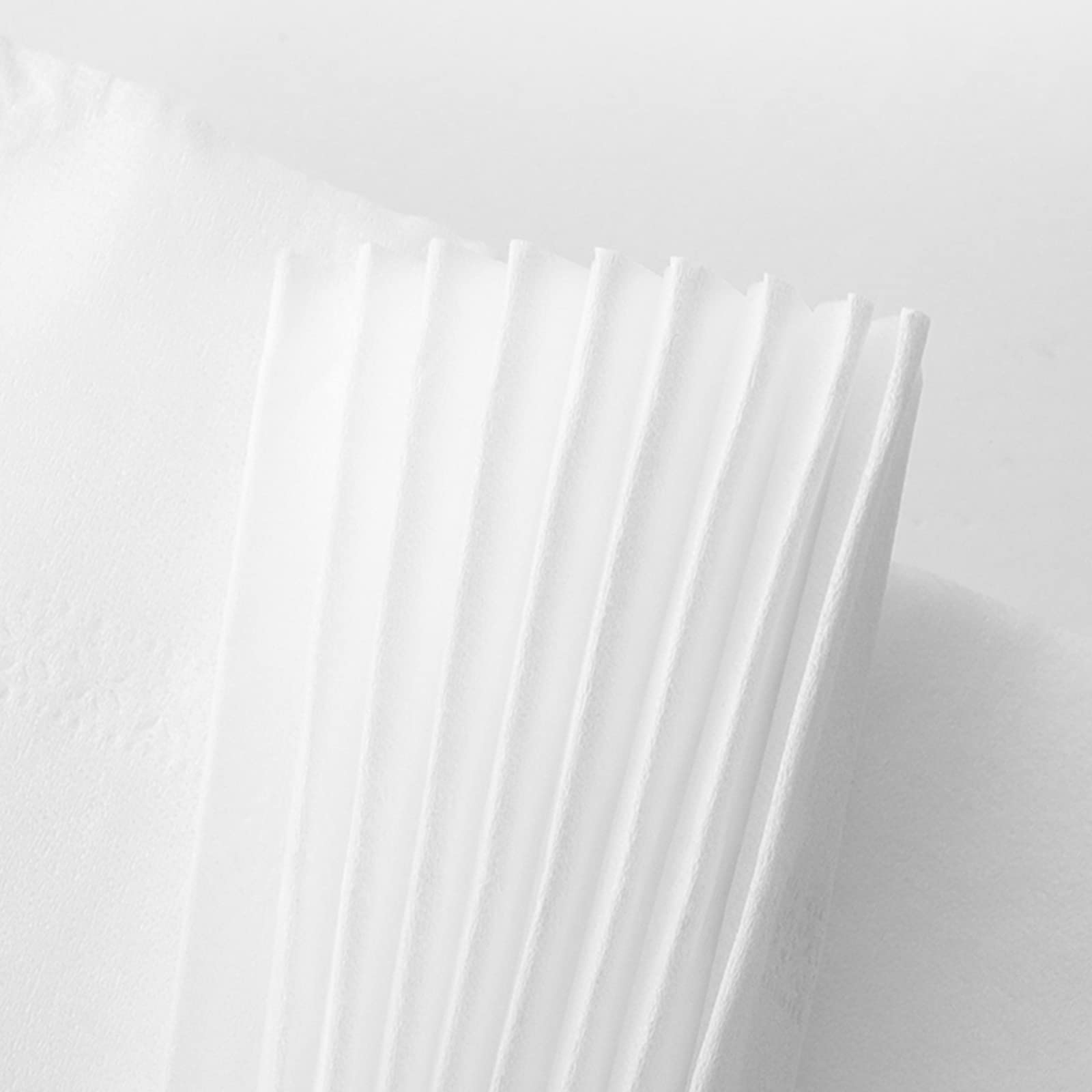SADYFON tissue wiping a spill to show damp-use strength and utility