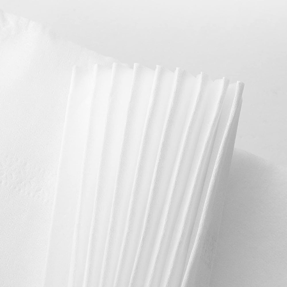 SADYFON tissue wiping a spill to show damp-use strength and utility