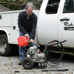 Scepter spout extender attached to spout enabling reach into tight tanks