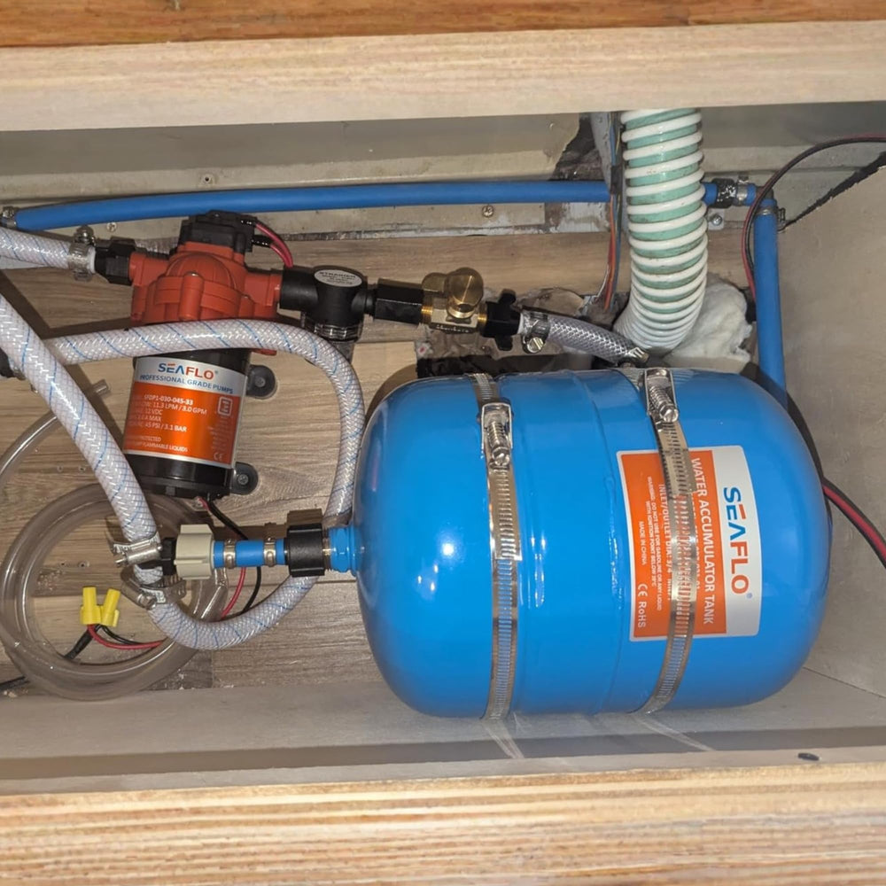 SEAFLO lifestyle image of a quiet shower on a boat with tank installed, delivers smoother water flow