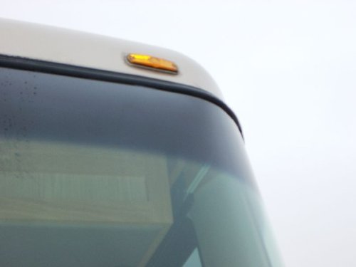 Seal Rubber installed on vehicle windshield showing improved edge protection and appearance