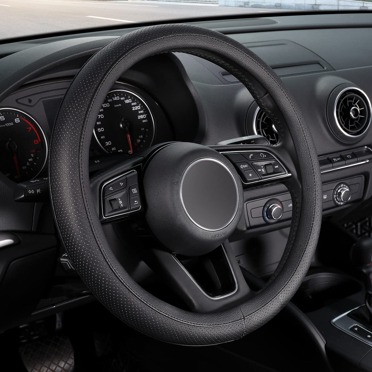 SEG Direct front view of black steering wheel cover shows clean aesthetic and fit
