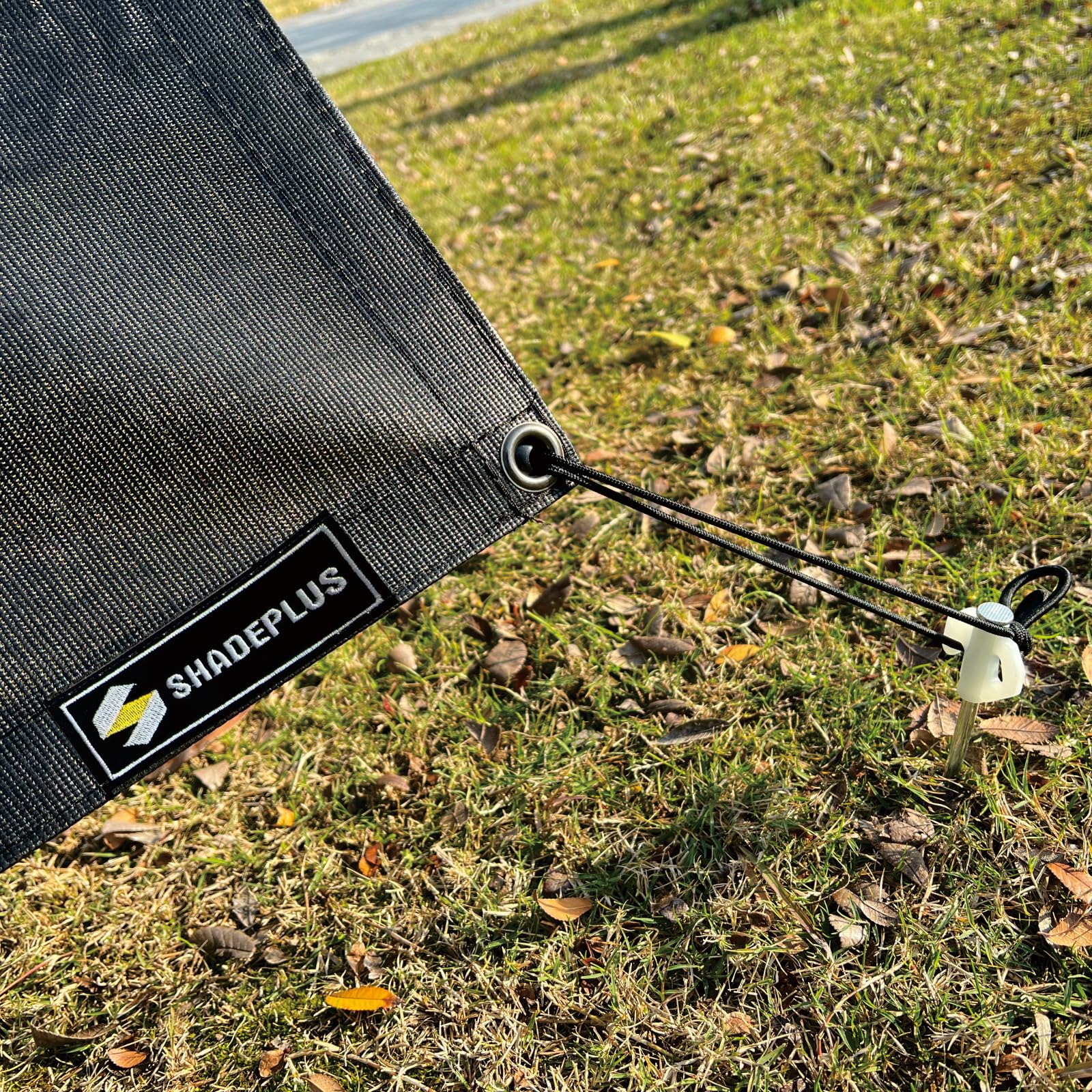 SHADEPLUS brand label and fabric edge showing construction quality