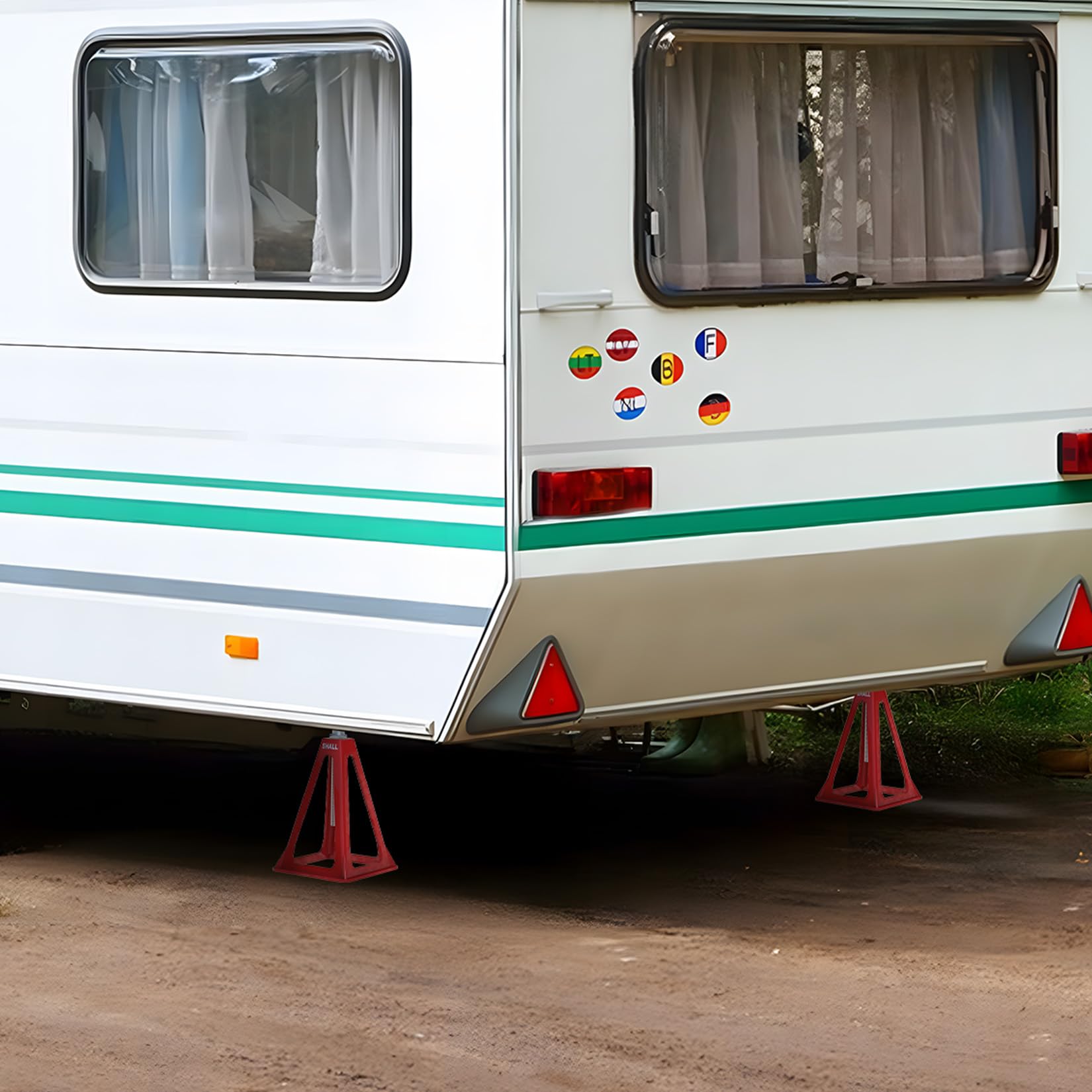 SHALL campsite scene with jacks stabilizing camper for a quieter stay