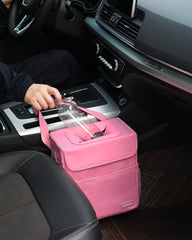SIBOFUEGO hanging from headrest showing secure strap and stable fit