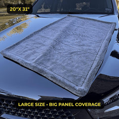 Sleek Dudes towel in use on car hood for fast, safe drying after wash