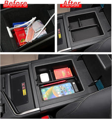 smabee tray installed inside GX550 armrest with lid open for easy reach