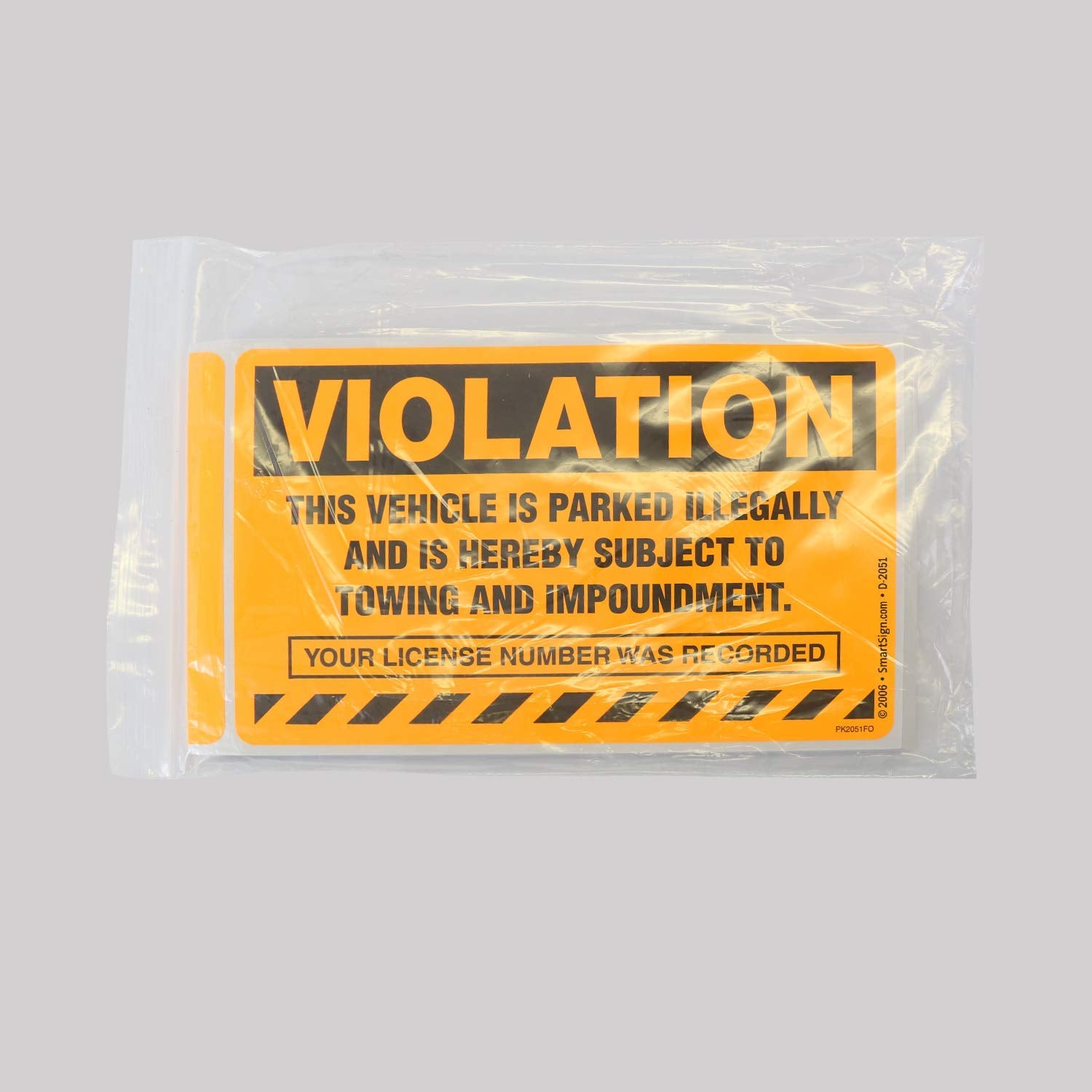 SmartSign being applied to windshield showing quick, secure placement