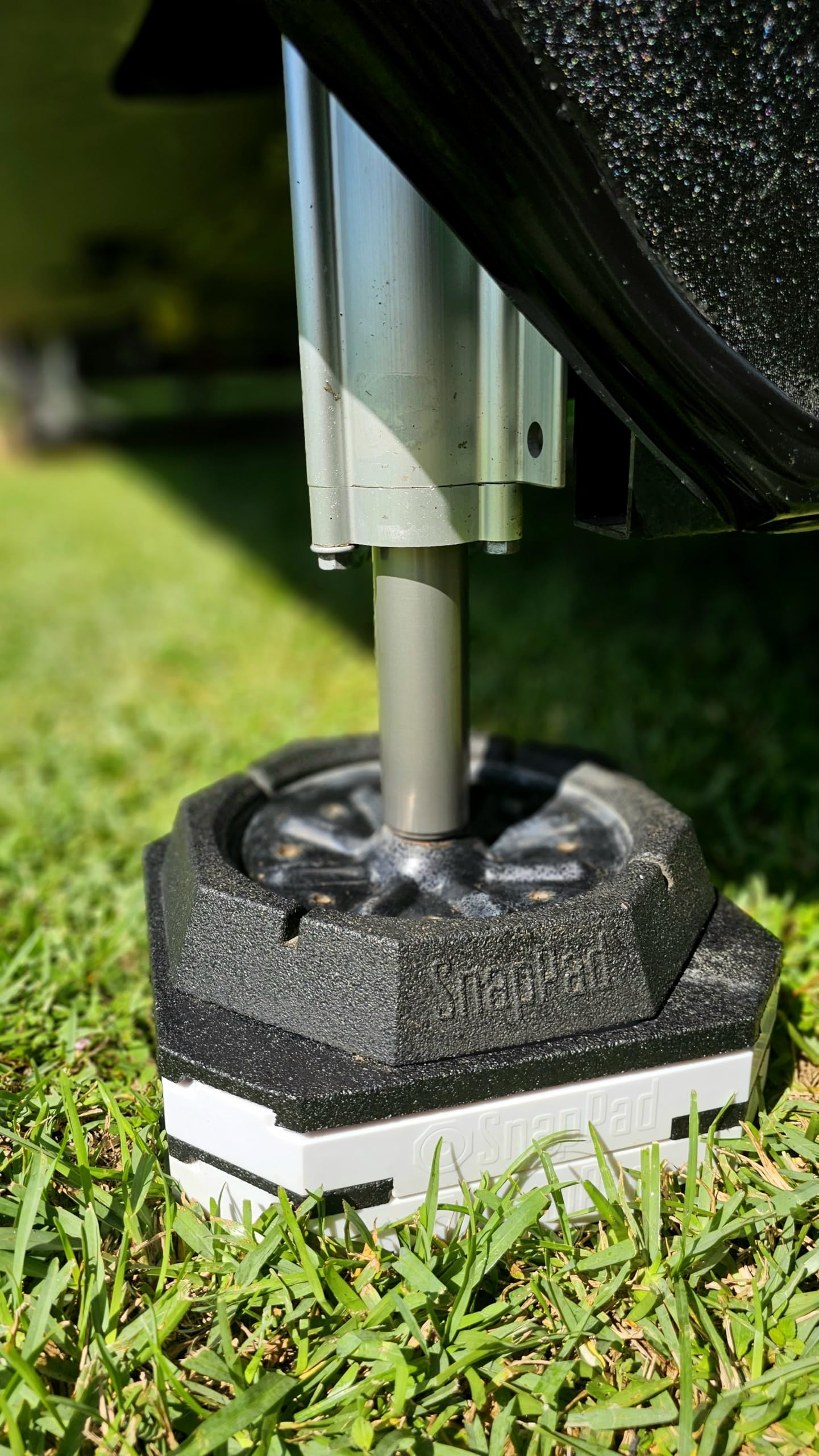 SnapPad at a campsite stabilizing a travel trailer for safer setup