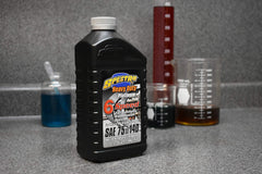 Spectro Oil being poured into a transmission showing smoother-shift benefit