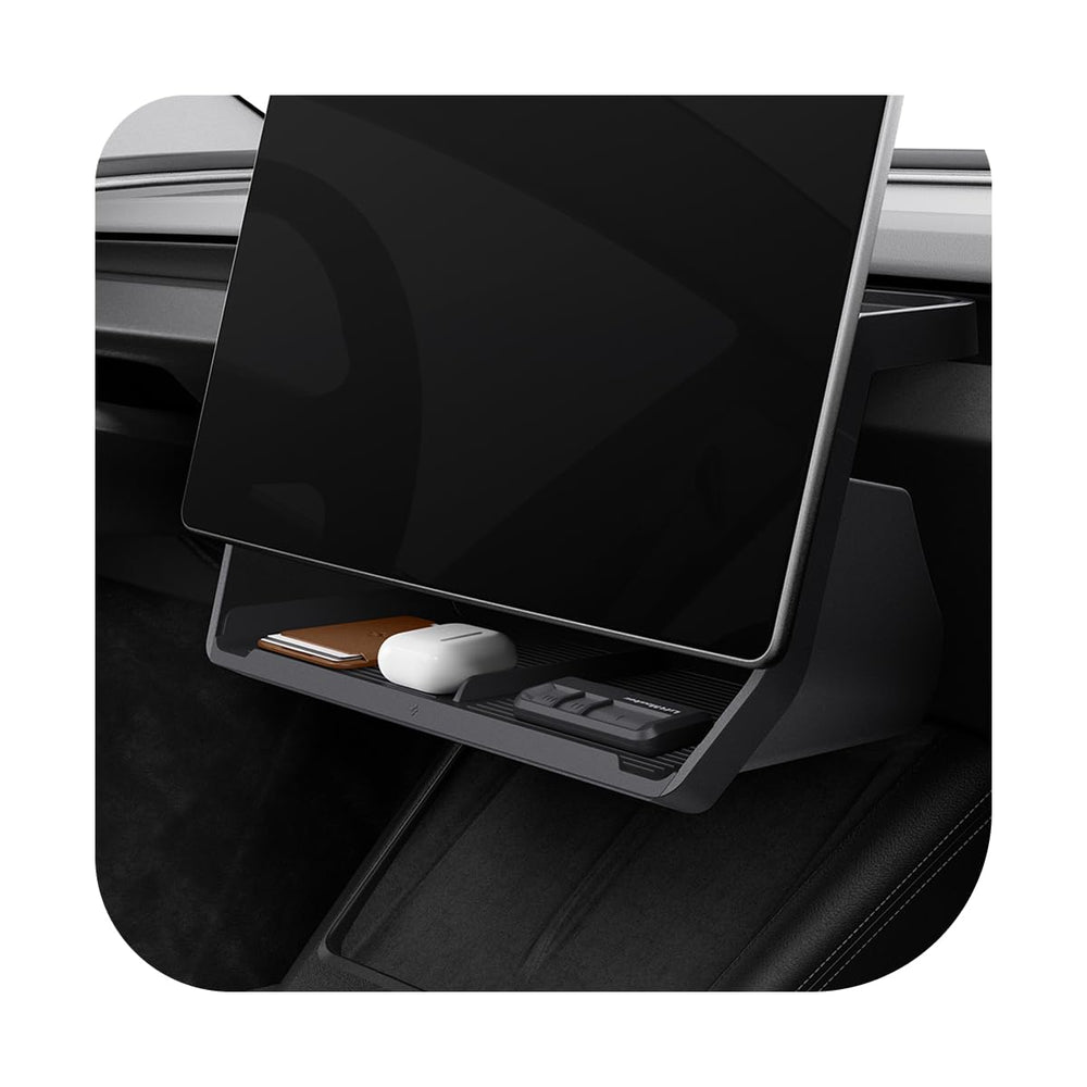 Spigen front installed under-screen tray in Tesla showing neat storage and easy access