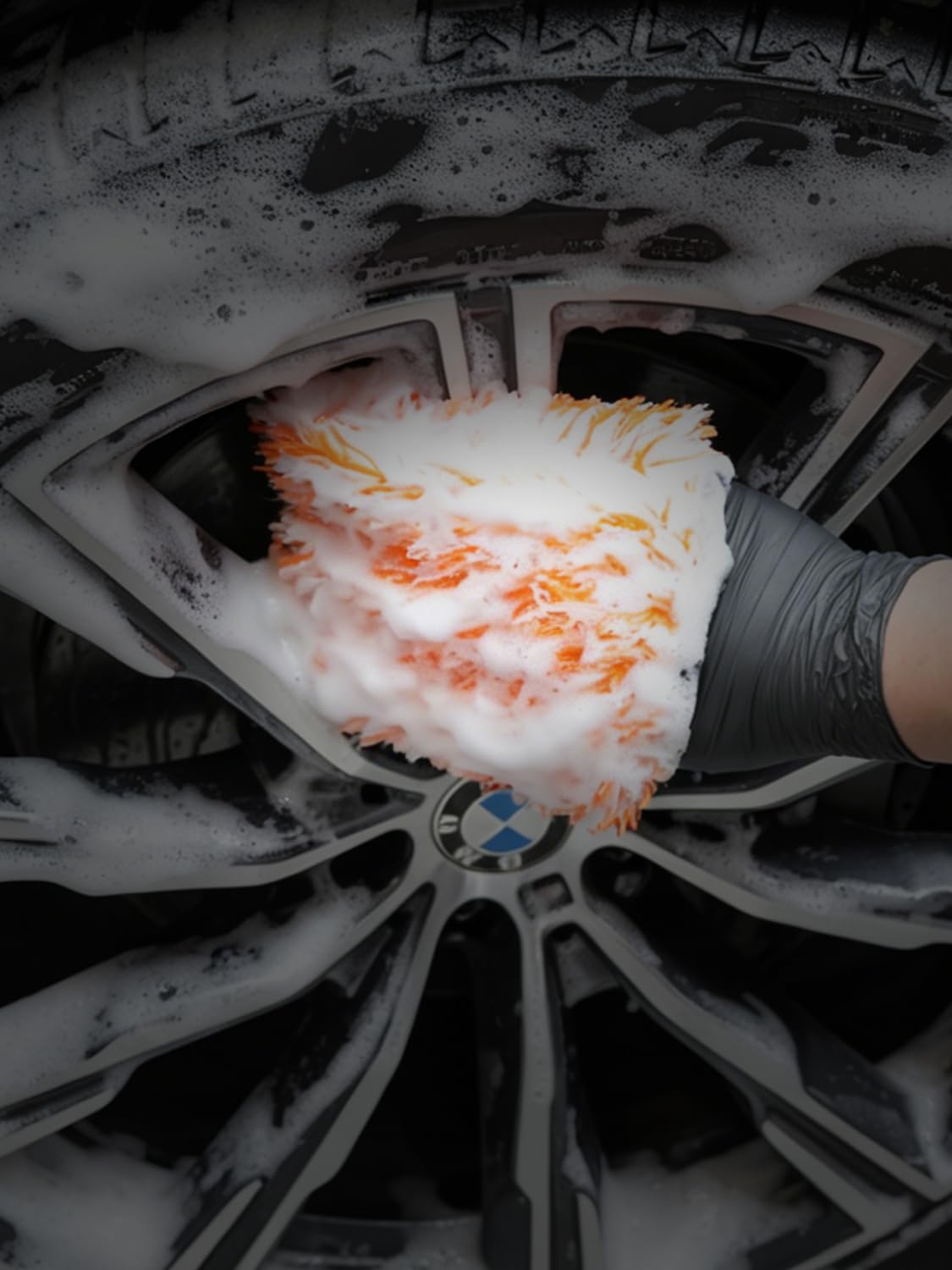 SPTA mitt beside bucket and foam cannon in lifestyle setup for detailing speed