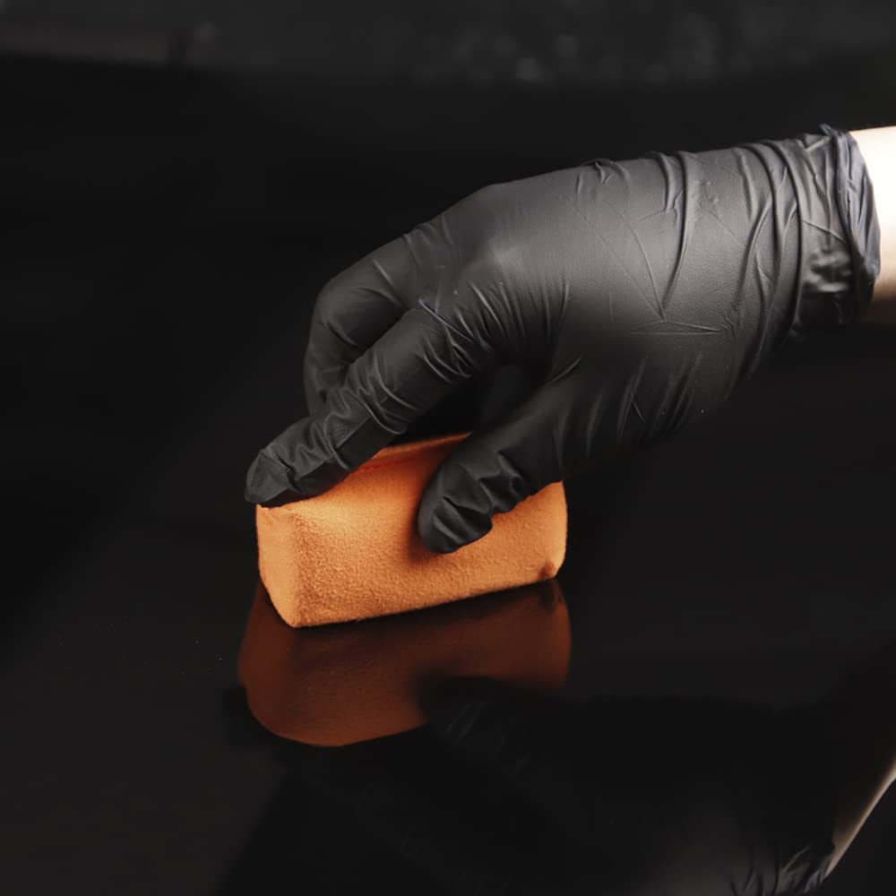 SPTA pad rinsed under faucet indicating washable reuse and cost savings