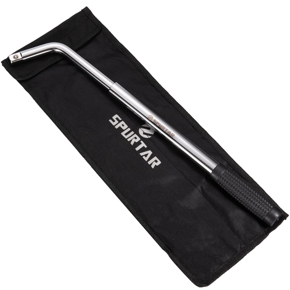 Spurtar lug wrench in use on a wheel delivering torque to loosen a lug nut