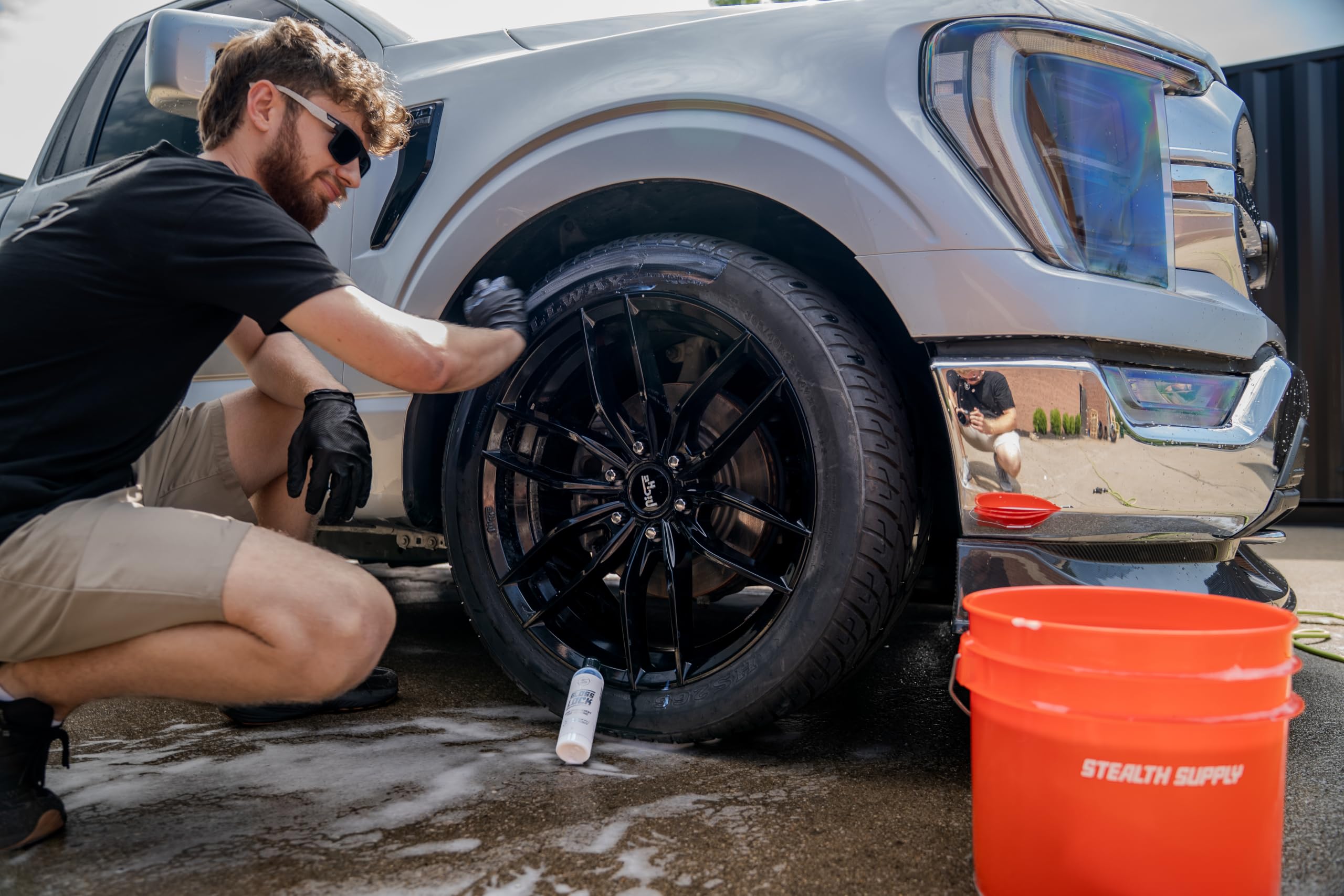 STEALTH GARAGE tire parked outdoors showing weather and grime resistance