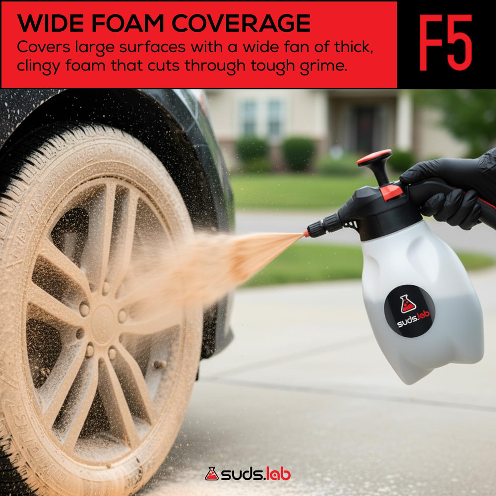 suds.lab spraying thick foam on car surface for clingy coverage and thorough cleaning benefit
