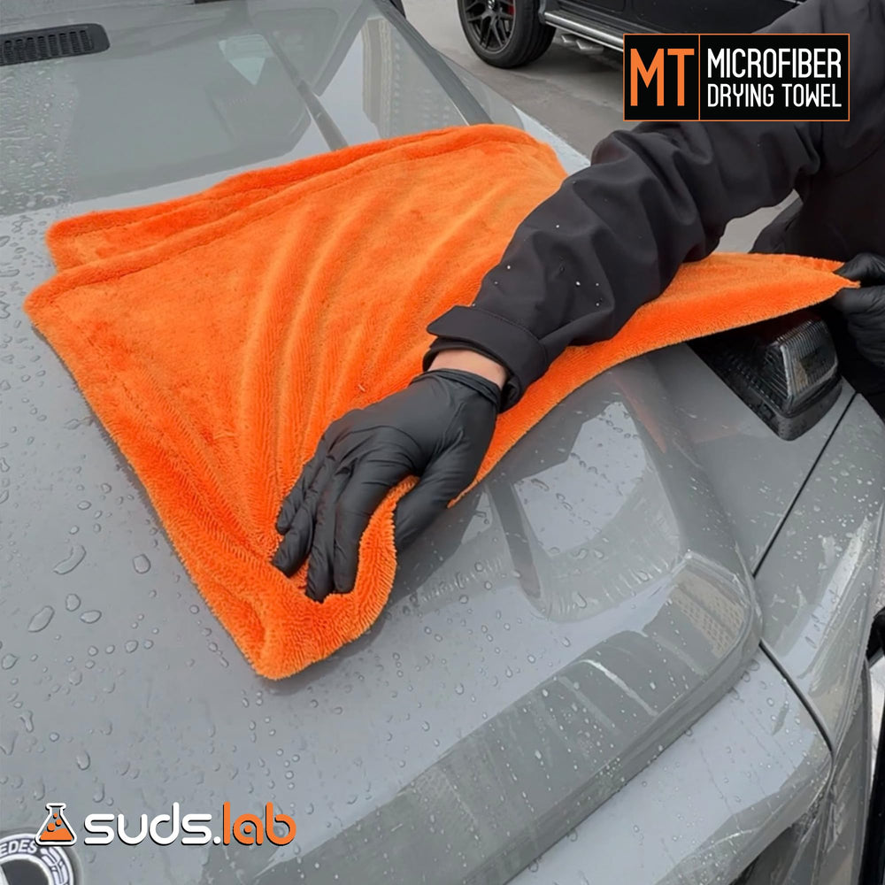 suds.lab towel staged with suds.lab products for optimized detailing results