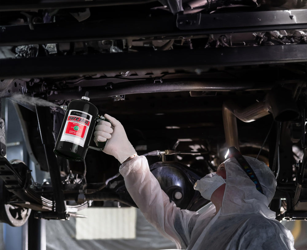 SURE SHOT in workshop setting showing practical, refillable aerosol alternative
