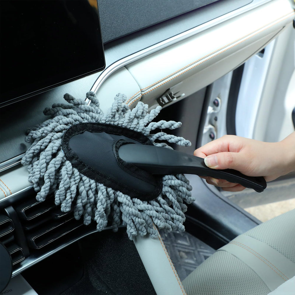 Tanlade duster used on dashboard vents and controls, detailing interior surfaces safely