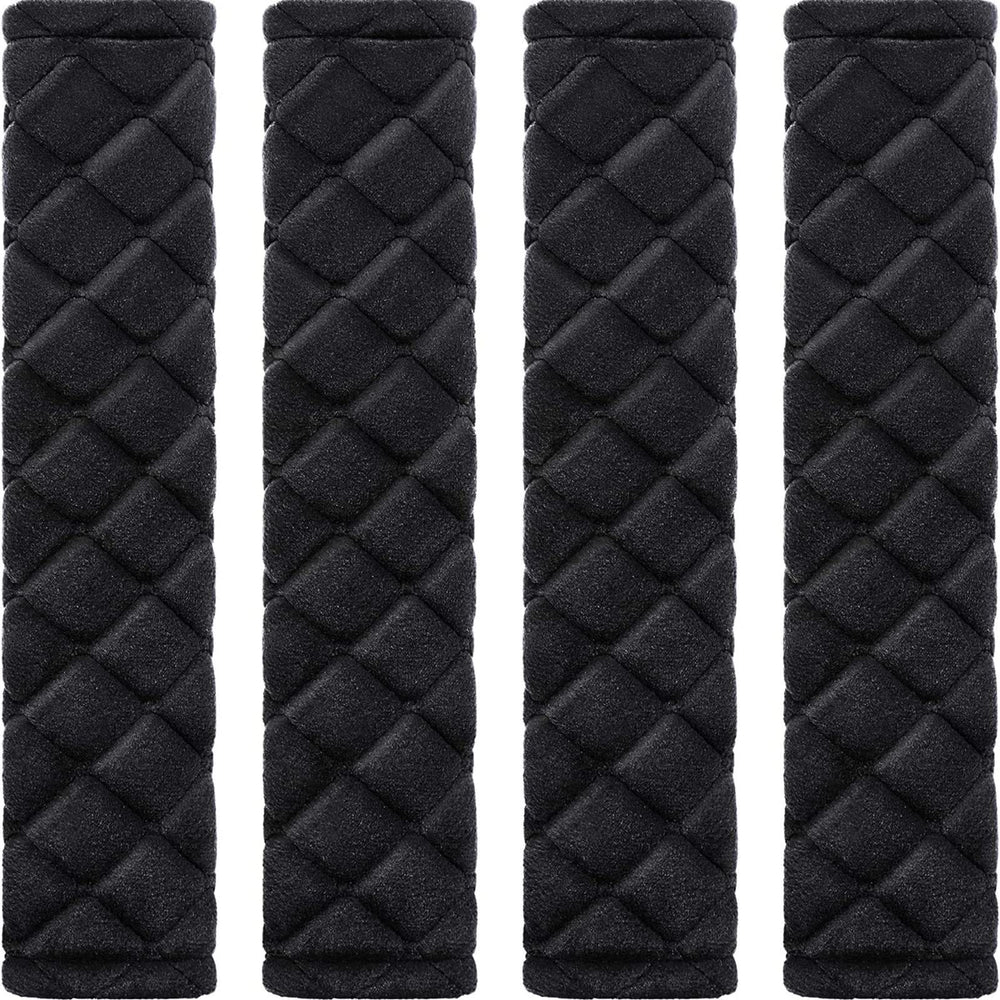 Tatuo front view of four black seat belt pads showing neat pack and style benefit