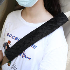 Tatuo installed on car seat belt demonstrating added comfort and reduced rubbing