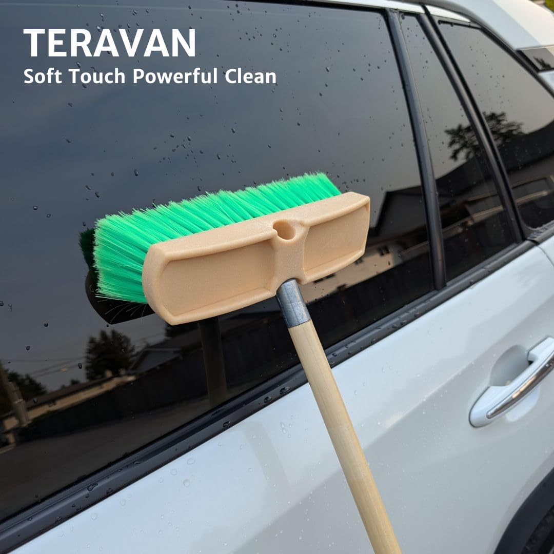Teravan brush held in hand for scale emphasizing 10-inch size and precise maneuverability